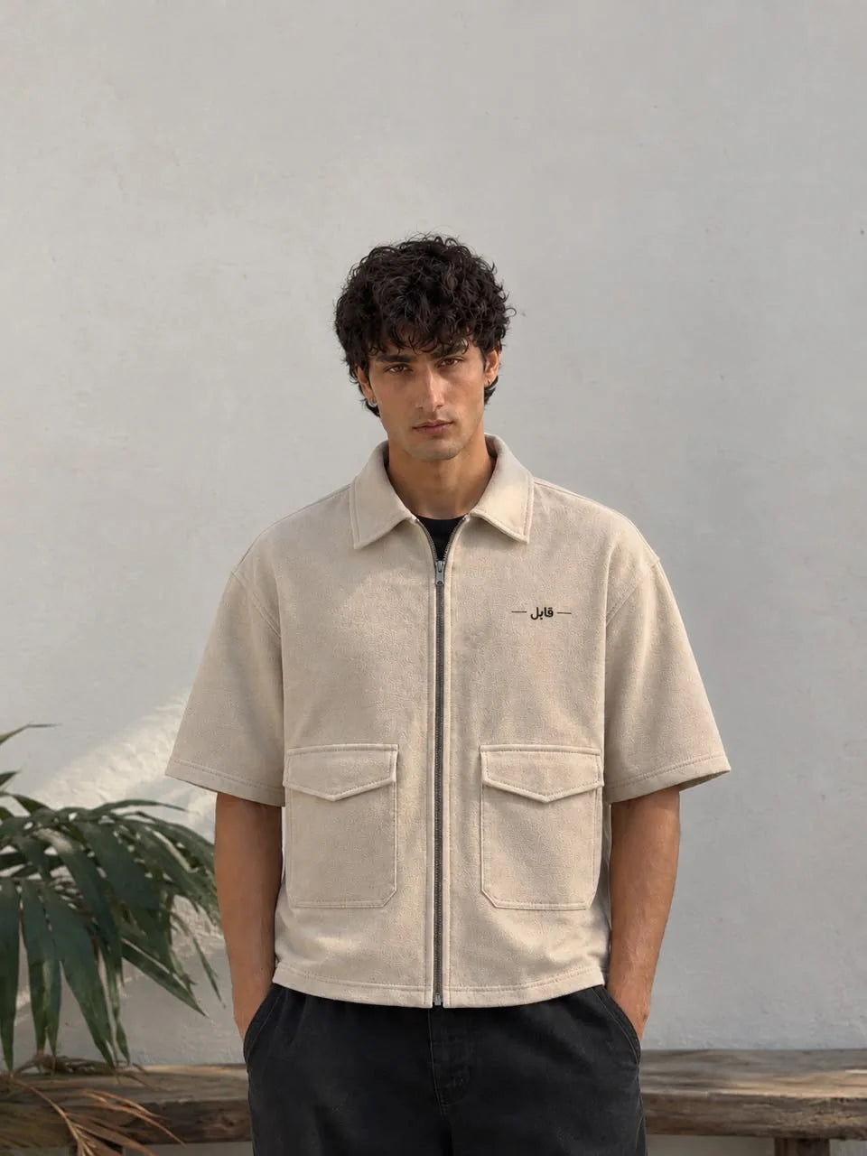 Sand beige QAABIL zip-up overshirt on model